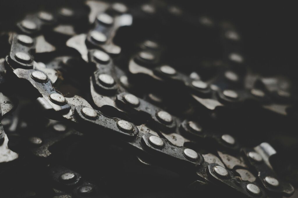 pexels photo 886601 886601 Detailed macro shot of a mechanical bicycle chain and gears, showcasing texture and wear.